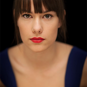 Tungsten light can be really useful in the studio, particularly if you want to work at the wider apertures on your lens. This photo was made using just tungsten light and a reflector placed under the model&rsquo;s face. The exposure was 1/125s @ f/1.4, ISO 400. Photo by Anthony McKee. Model: Dalena from LMC models, New Zealand.
